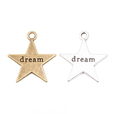 Group view of a five-point star carries a dark recessed dream inscription