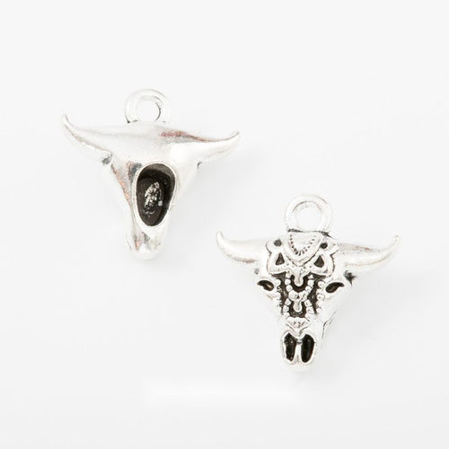 Group view of longhorn cattle skull silhouette with engraved face details