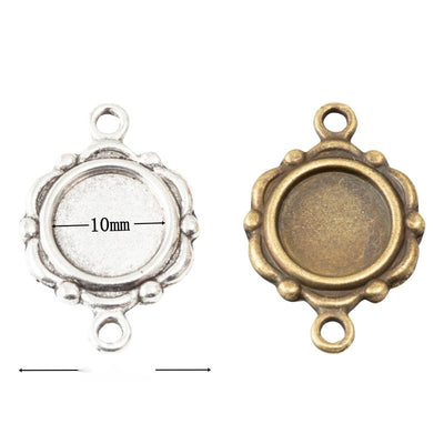 Group view of small round recessed tray framed by a scalloped floral edge