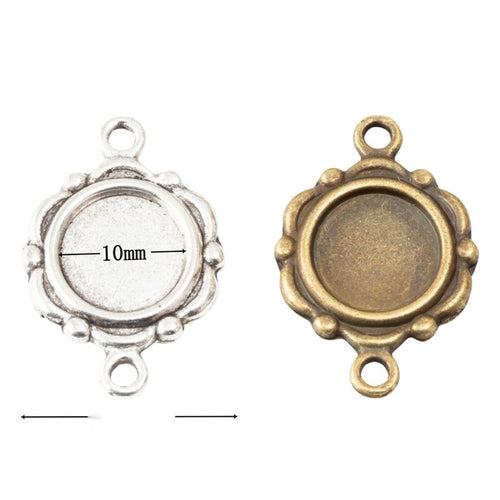 Group view of small round recessed tray framed by a scalloped floral edge