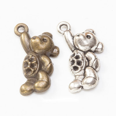 Teddy bear metal component, grouped front view on white