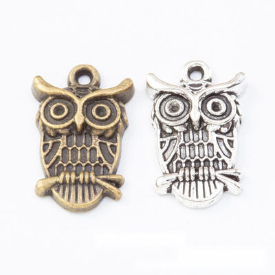 Owl charm shown across the available finishes