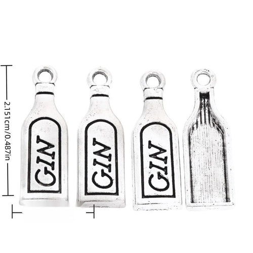 Front and reverse views of gin bottle charms with measurement and weight guides