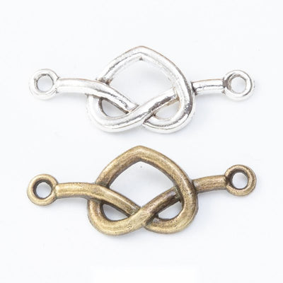 Interlocking Heart Connector finish comparison showing two interlocking heart outlines and loops at both ends