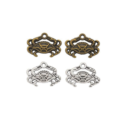 Ornate Crab metal charm displaying front and reverse sides
