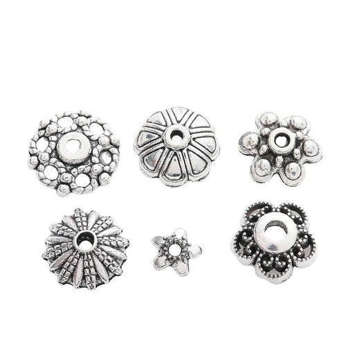 Mixed Flower Bead Caps showing six distinct flower and sunburst cap designs