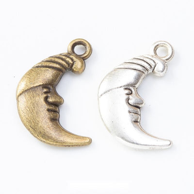 Overview of crescent moon face charms in the available designs and finishes