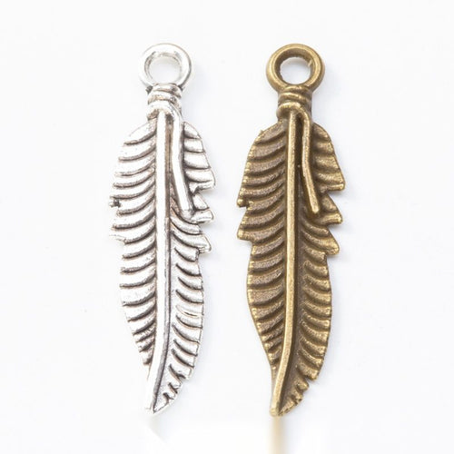 Feather Charm Pendant finish comparison showing a curved central quill and layered barbs