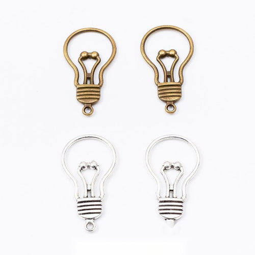 Light Bulb Outline Metal Charms grouped product view on a white background