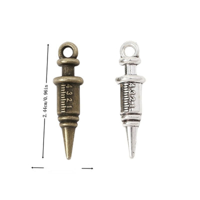 Assorted syringe shaped charm shown from the front