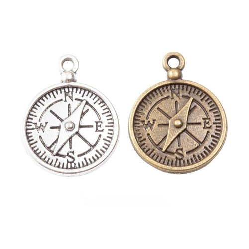 detailed compass metal charm shown from the front in the available metallic finishes