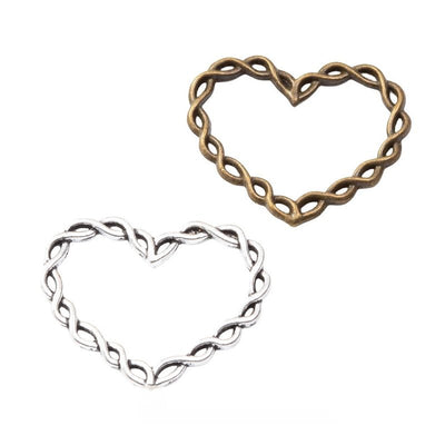 Front view of open chain-link heart connector showing finish variation 1