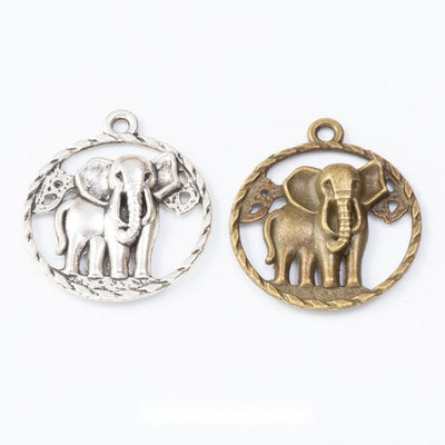 Group view of the elephant medallion charm showing the available finishes and front details