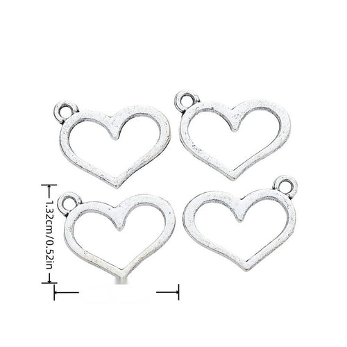 Simple open heart outline charm with a small top loop shown in arranged finish comparison