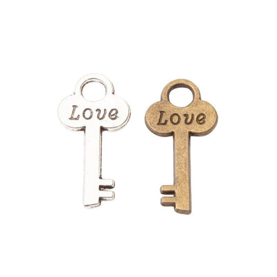 Love Key Charm finish comparison on a white background