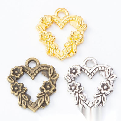 Floral Heart Charm grouped finish options on a white background