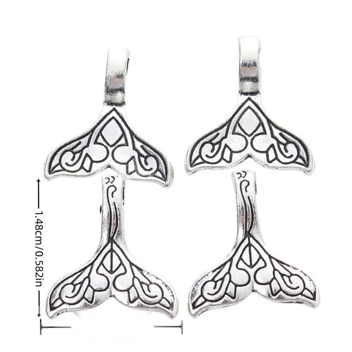 Product image showing the two loop whale tail connector charm and its visible metal details