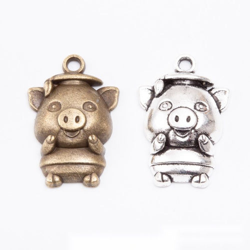 Front-facing pig with a rounded body and raised snout shown in the available finishes