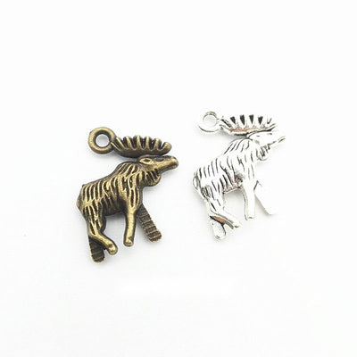 Detailed Moose Profile Metal Charms in Two Finishes in multiple metallic finishes displayed together on a white backgrou