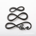 Infinity Link Connectors in Three Black Metal Designs view 1