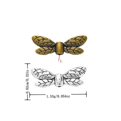 Grouped front view of leaf pattern wing spacer beads in the available finishes