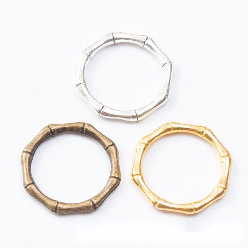 Grouped front views of the bamboo texture open ring connector in three metallic finishes