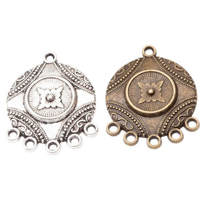 Product view of round floral connector showing a round floral connector with a raised center, one top loop, and five low