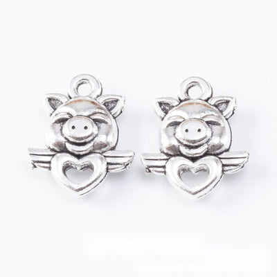 Group view of pig with heart styles on a white background