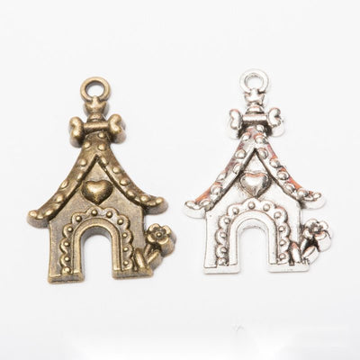 Heart Detail Doghouse Metal Charms in Two Finishes in multiple metallic finishes displayed together on a white backgroun