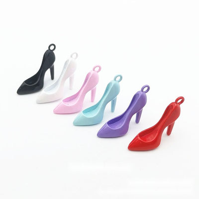 Group view of high heel shoe styles on a white background