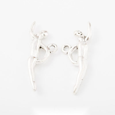 Swimmer Figure Metal Charm Pendant shown in the available visible finishes