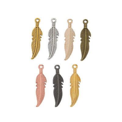 Group view of curved feather styles on a white background