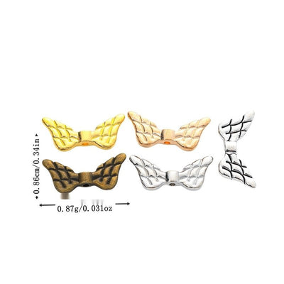 Angel Wing Bead metal component, front grouping showing the available finishes.