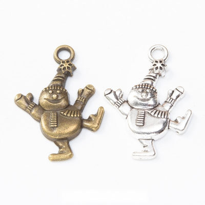 Grouped front view of skating snowman charms in the available finishes