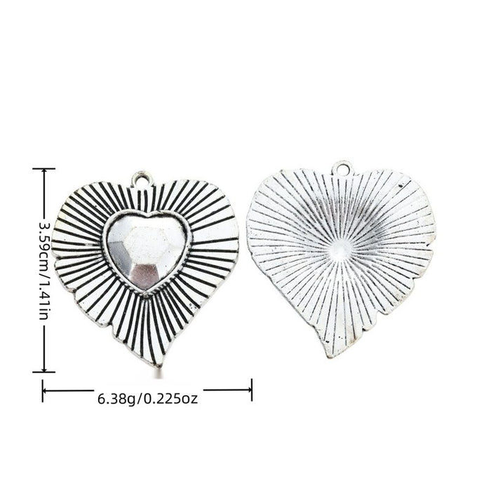 Radiating Heart Metal Charm with Raised Center in Silver Tone