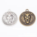 Round Lion Head Medallion Charm In Antique Bronze and Antique Silver Metal Finish view 1