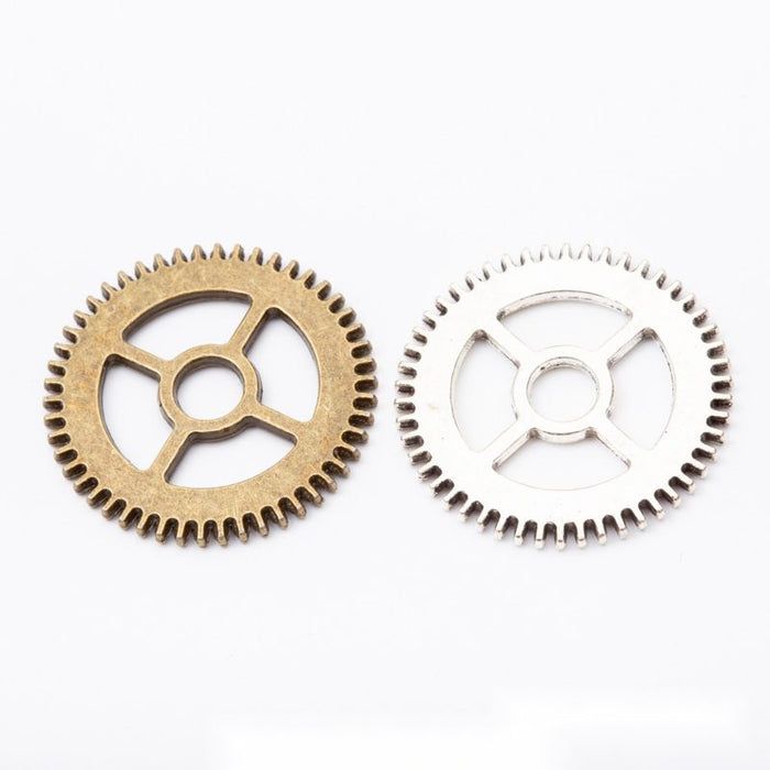 Openwork Gear Components In Silver And Antique Bronze