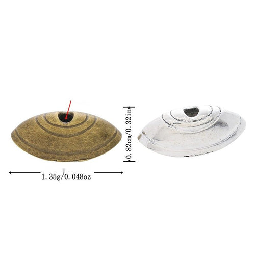 Metal ridged shell-shaped bead cap, front and reverse views shown in the product image