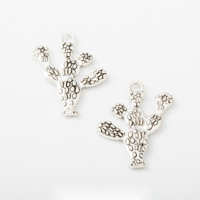 Product view of cactus charm showing a prickly pear cactus silhouette with textured pads and a top loop