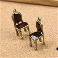 Antique Bronze Red Enamel Chair Charm With Dimensional Form view 1