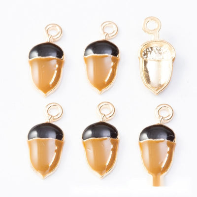 Overview of brown acorn charms in the available designs and finishes