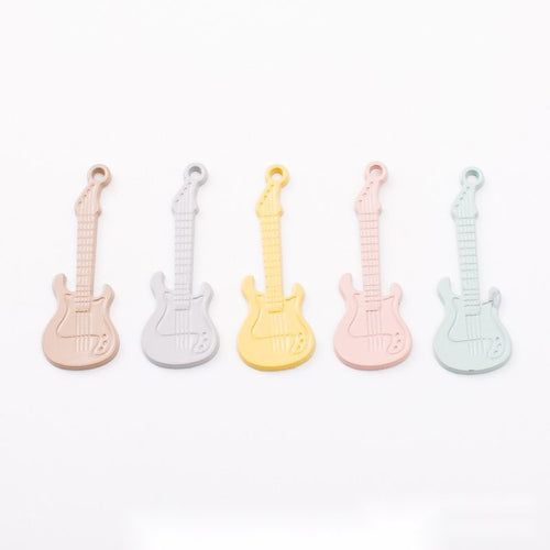 Painted Electric Guitar metal design group view on a light background