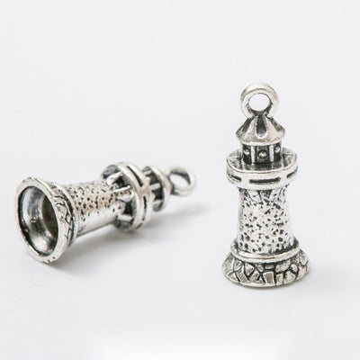 Detailed Lighthouse Charm finish assortment on a white background