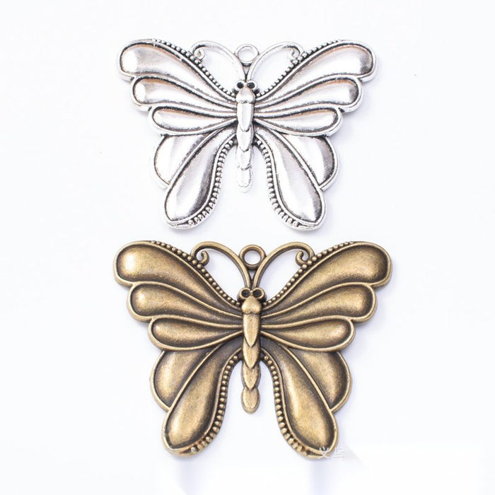Antique Metal Layered Butterfly Charm Pendant With Textured Detail, 2 Finishes