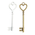 Long Heart Bow Key Metal Charm for Jewelry Making in Antique Bronze and Antique Silver view 1
