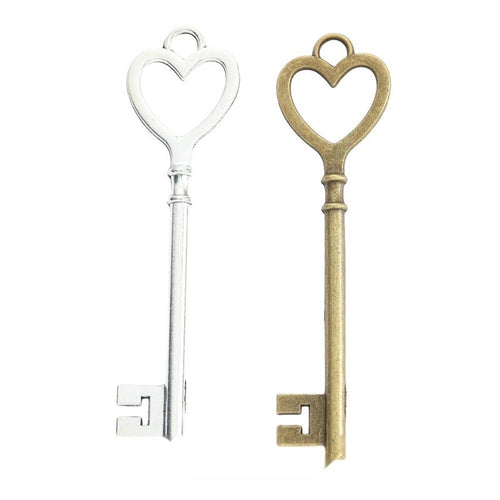 Front display of the long heart bow key in its pictured metal finishes