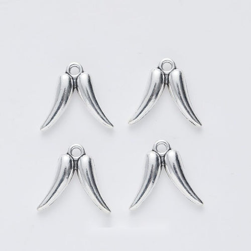 Smooth Angel Wing Charm shown in the available metal finishes on white