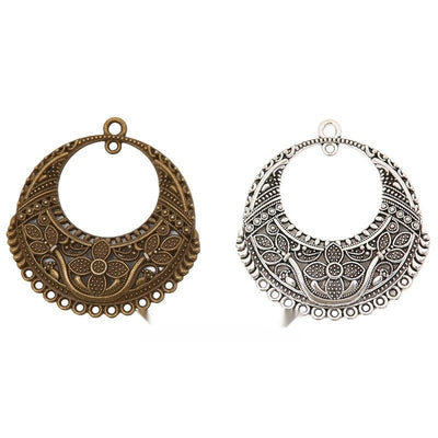 ornate round multi loop metal connectors in two finishes shown together in the available finishes