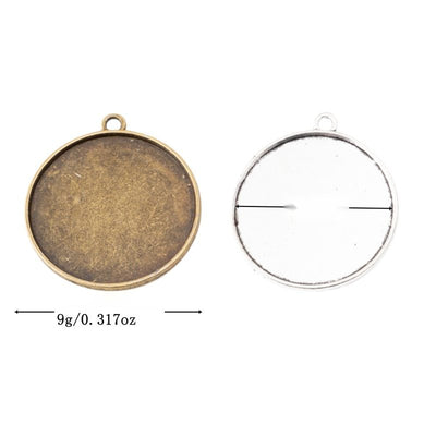 Grouped front view of large round cabochon pendant settings in the available finishes