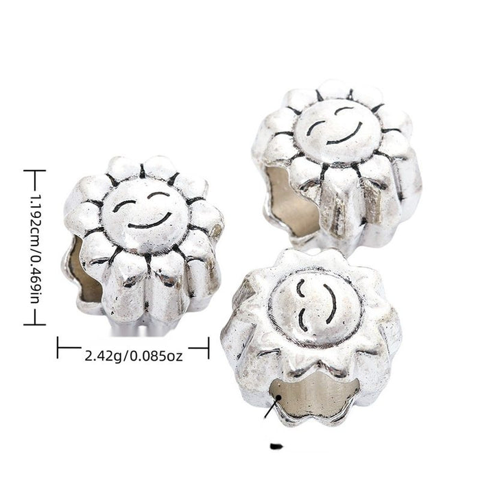Smiling Flower Large Hole Bead with a smiling flower face in Antique Silver